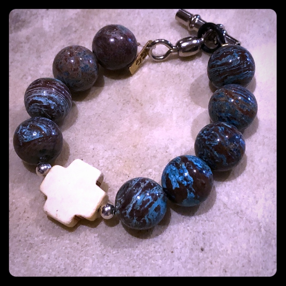 Beautiful high end stone bracelet with cross.